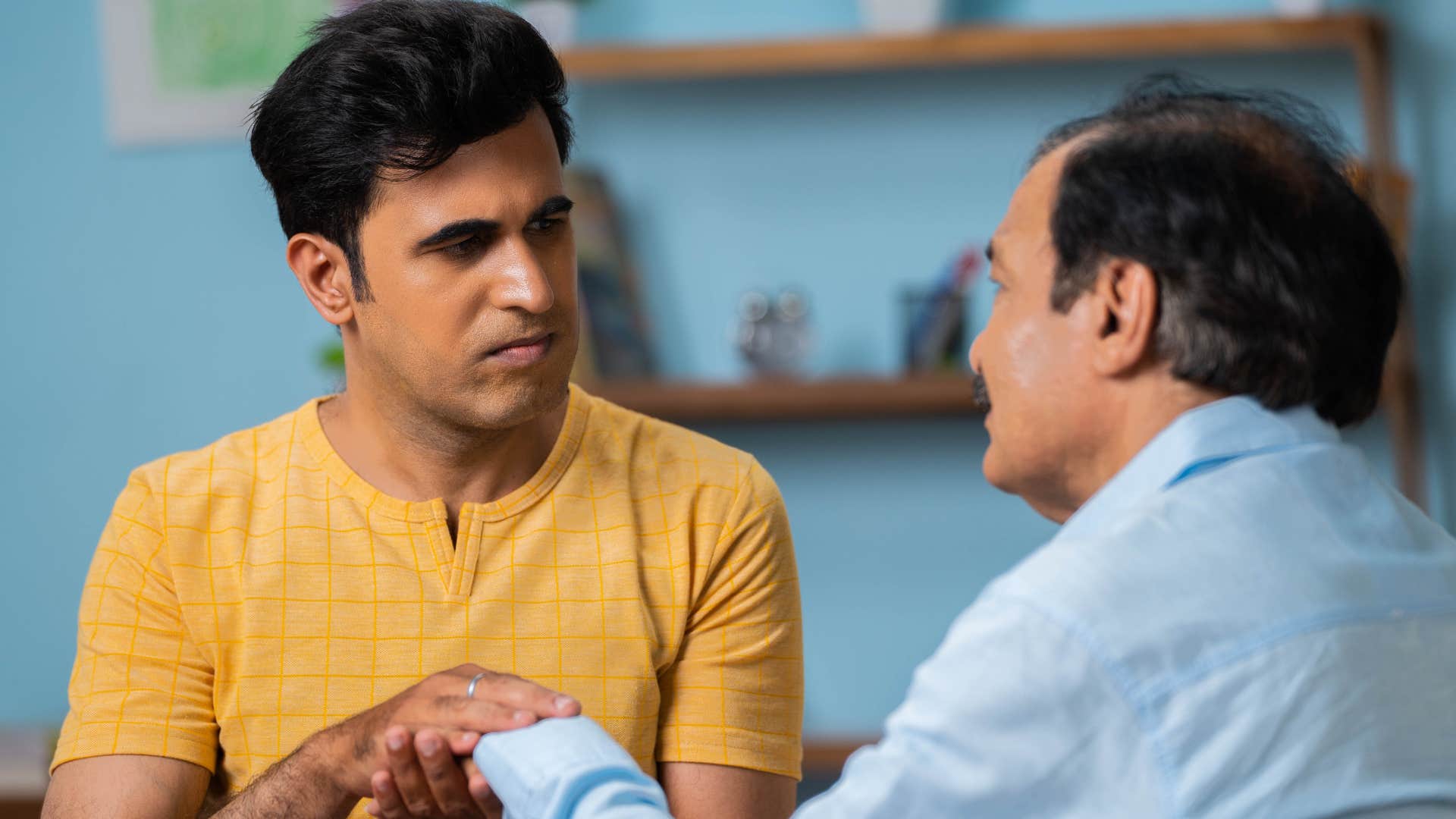 Man underestimating money struggles with his adult son.