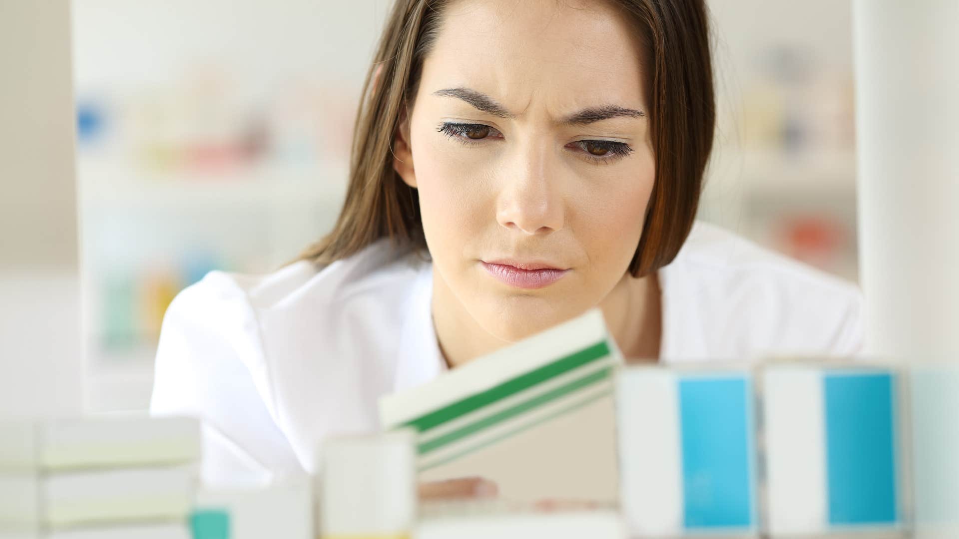 woman check medicine before guests come over