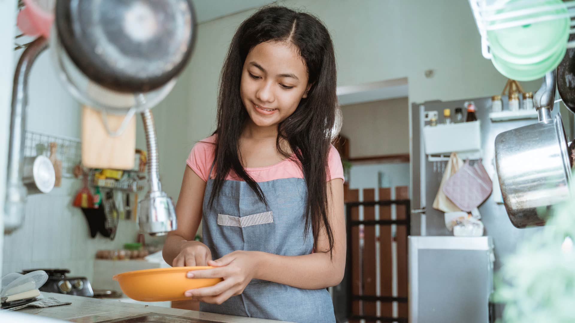 girl doing her chores