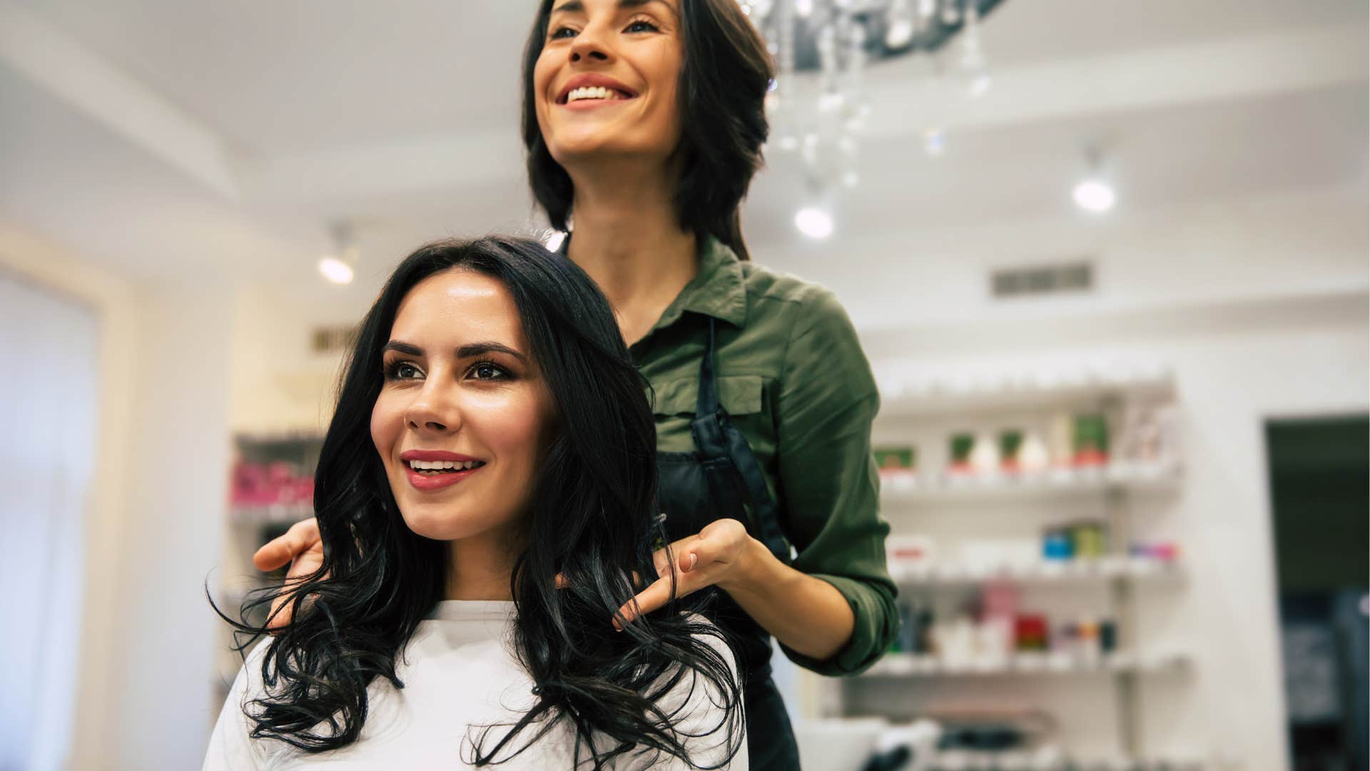 woman with wellness maintenance routine getting her hair done at a salon