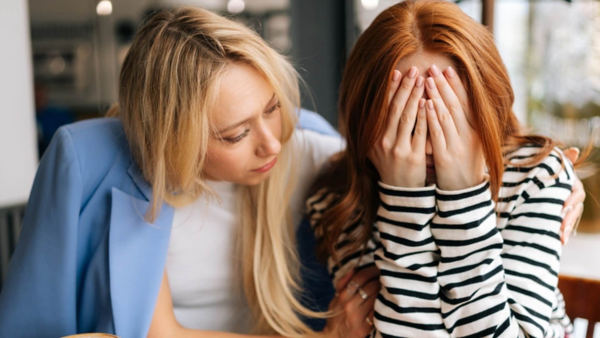 woman being the therapist friend and comforting upset friend
