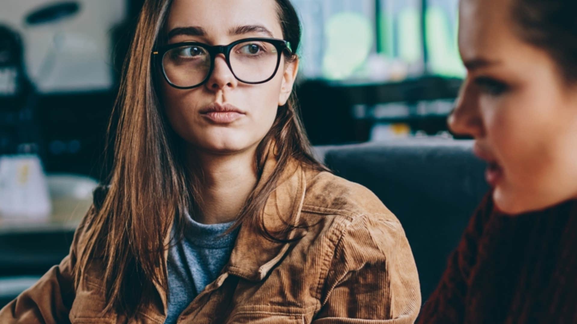 people pleasing woman allowing person to talk over her 