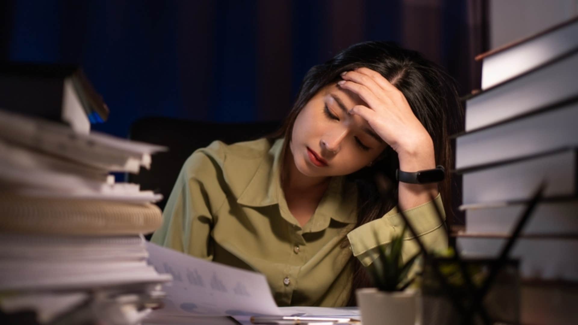 tired woman taking on extra work no one else wanted to do