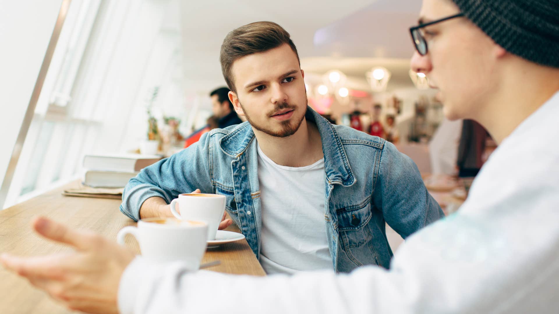 man admitting he doesnt know the details in conversation