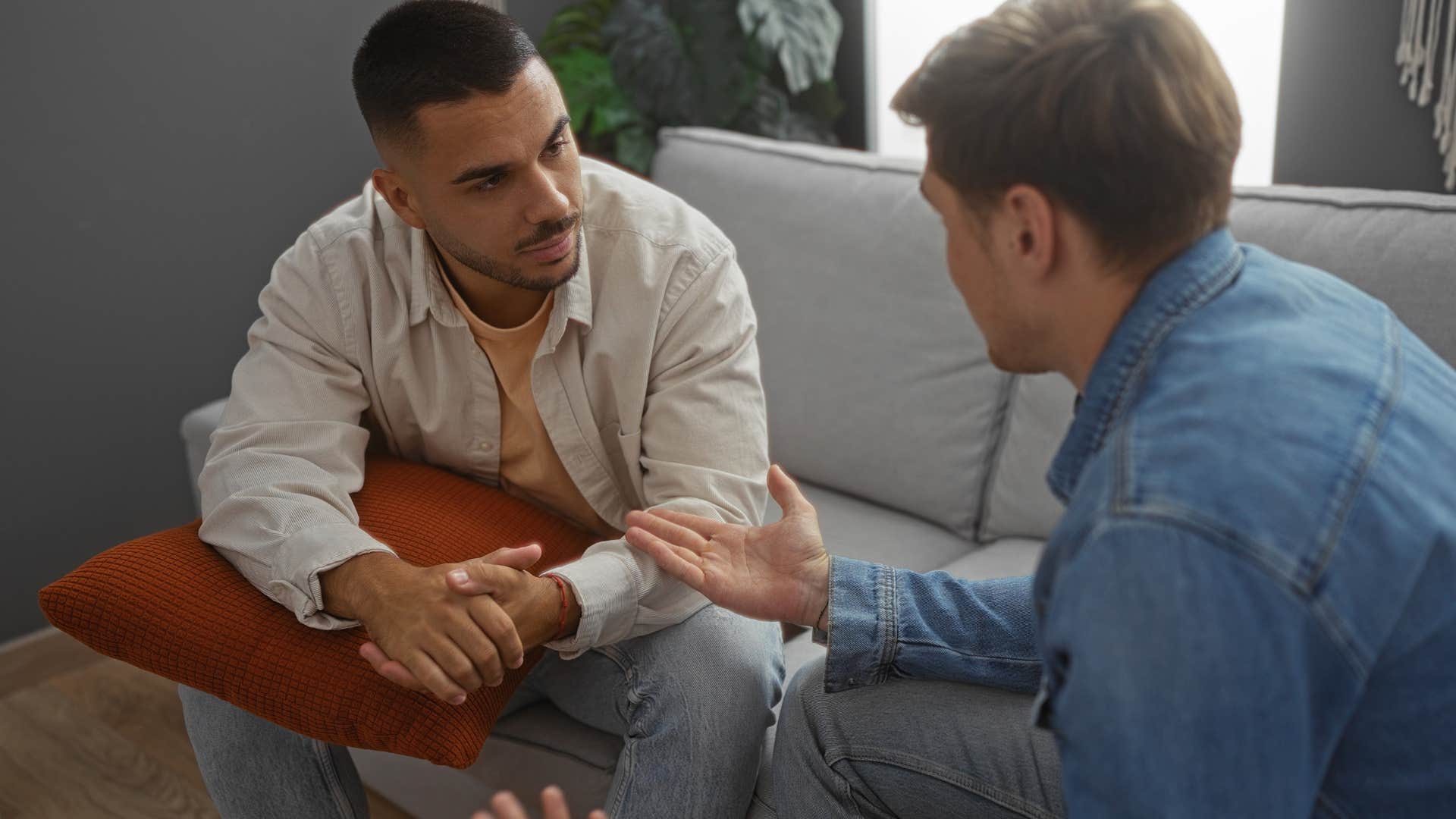 man explaining to friend that a concept is not rocket science