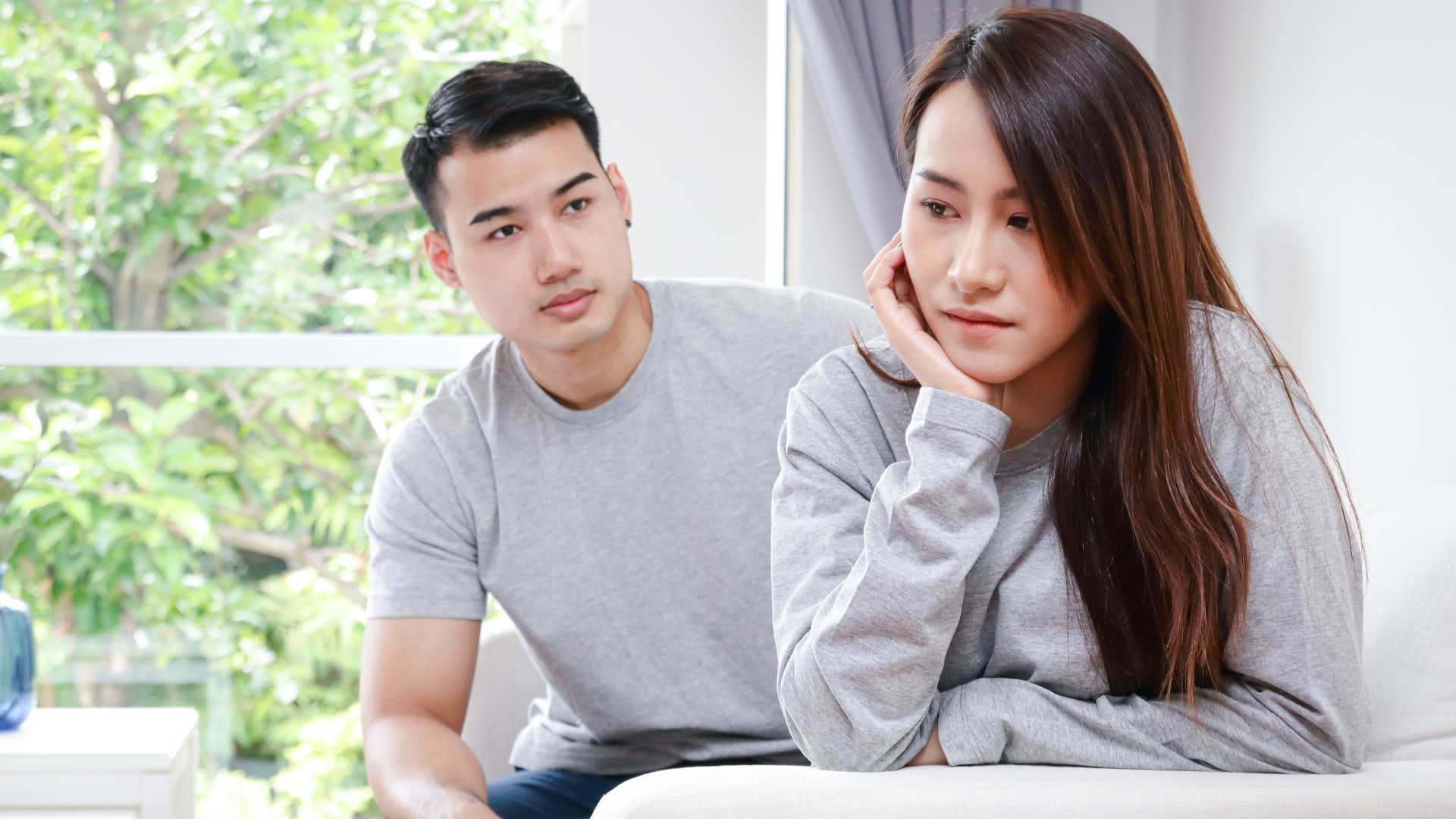 woman turned away from partner wondering if shes too much for him