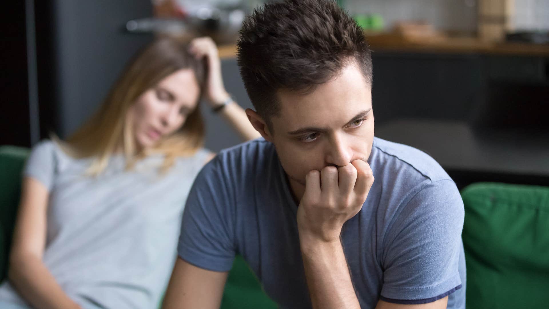 insecure man thinking his partner will leave him
