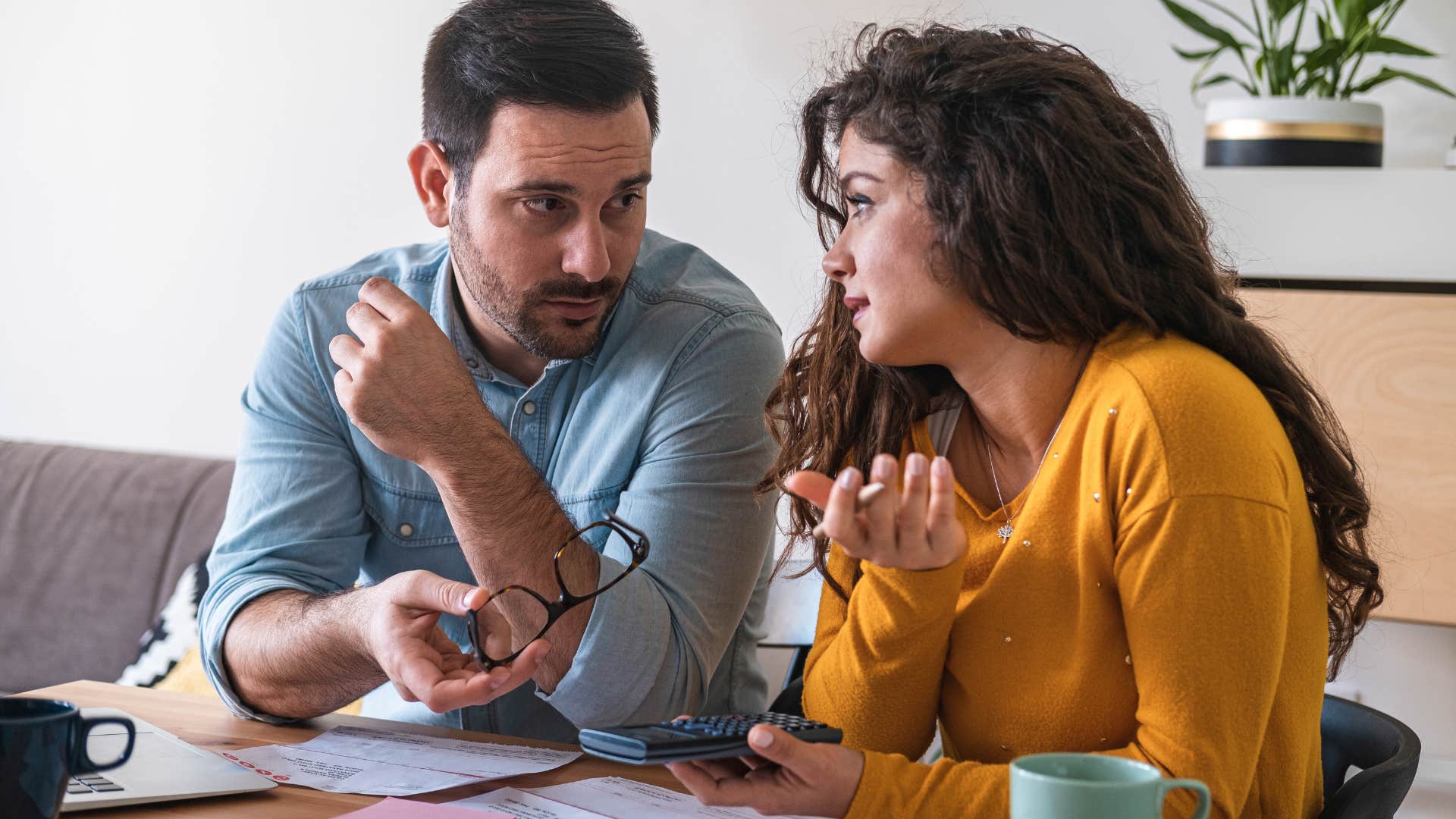 woman having a conversation with partner for him to never leave her