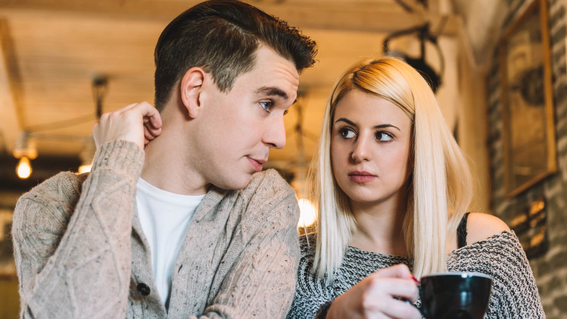 couple looking serious having a conversation