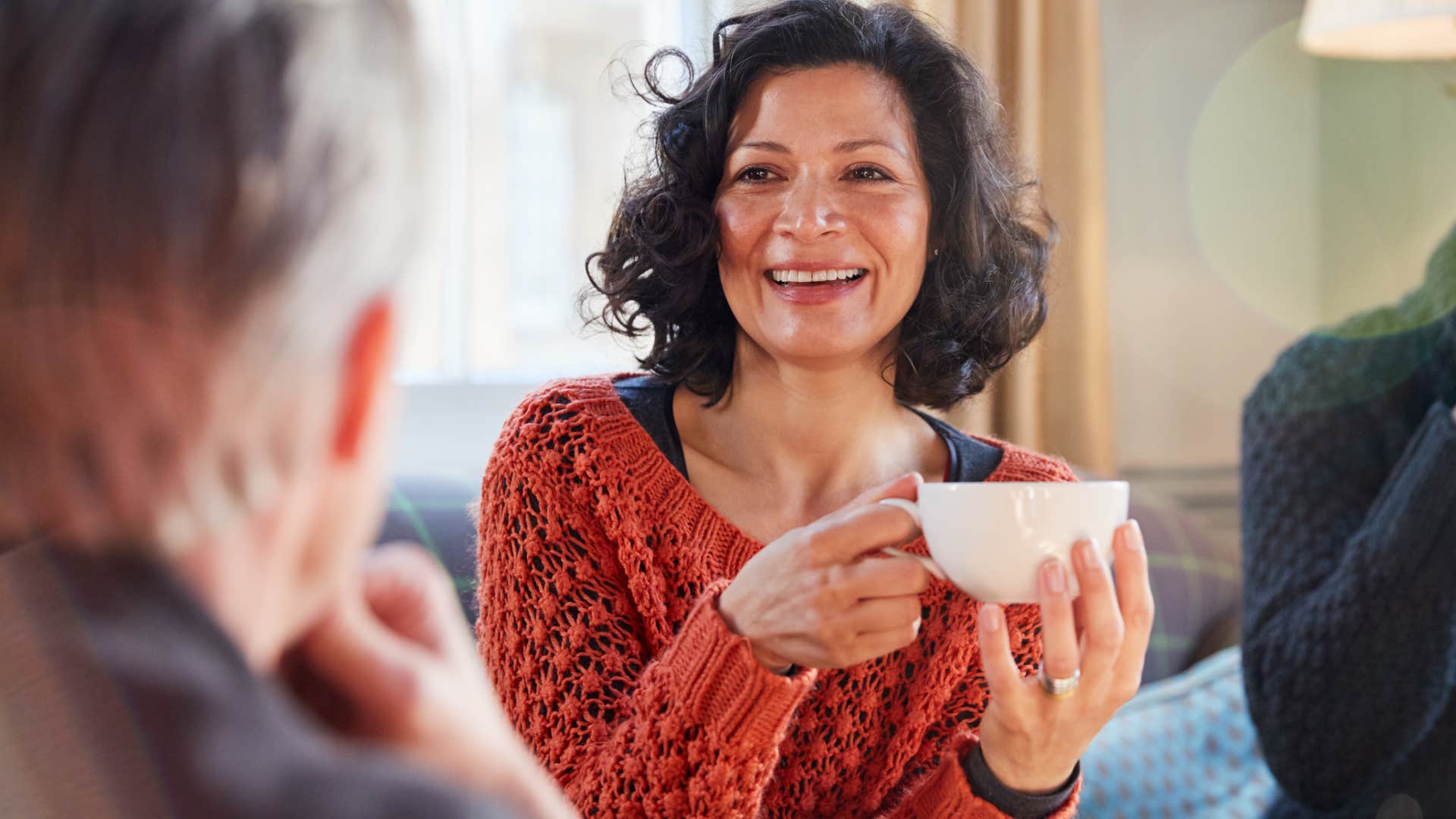 woman not gossiping with friends smiling