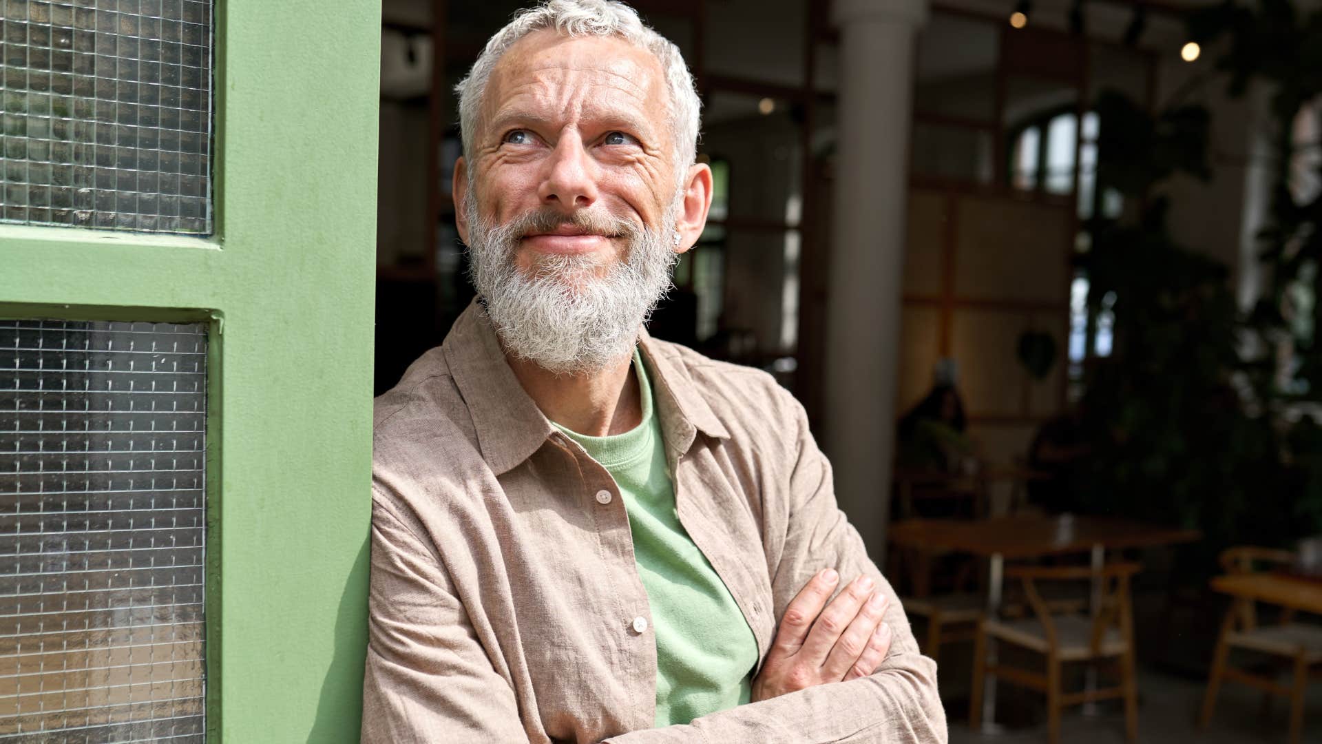 intelligent man without a poor work-life balance smiling