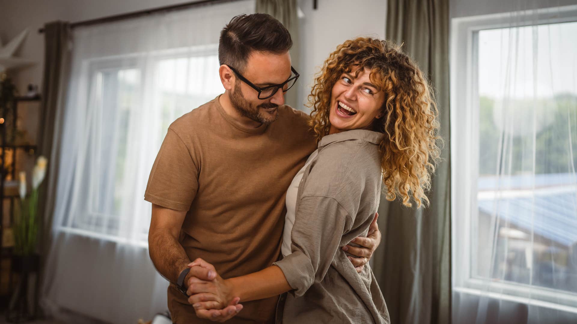 woman taking the lead in her relationship dancing