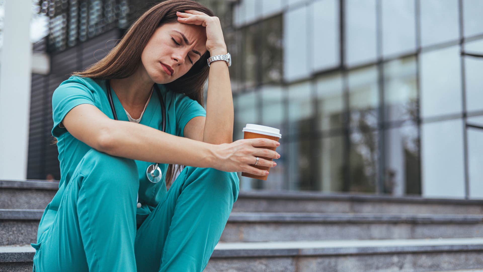 woman making work her entire identity looking stressed