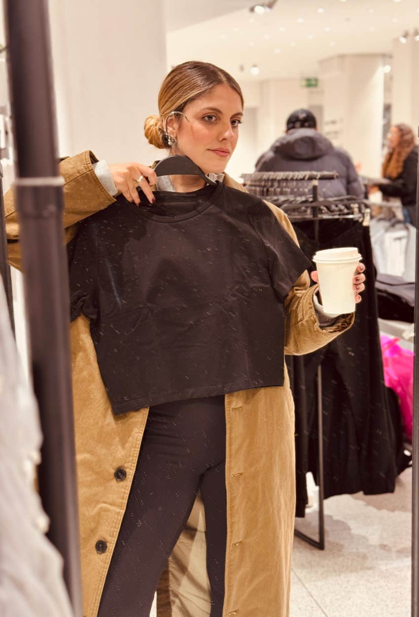 Woman buying first hand clothes because she wasn't allowed to own them as a kid