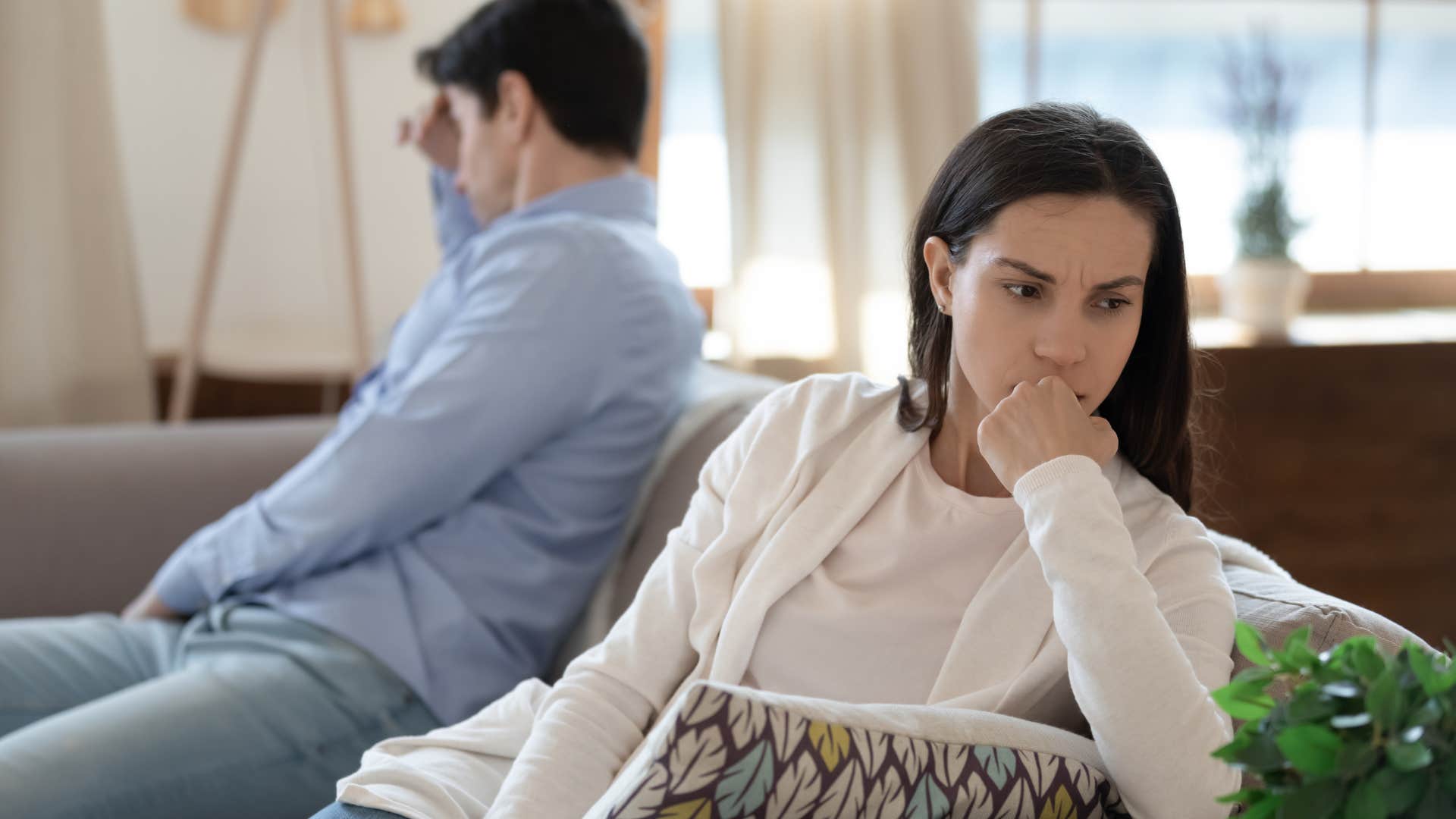 woman withdrawing physical affection from husband