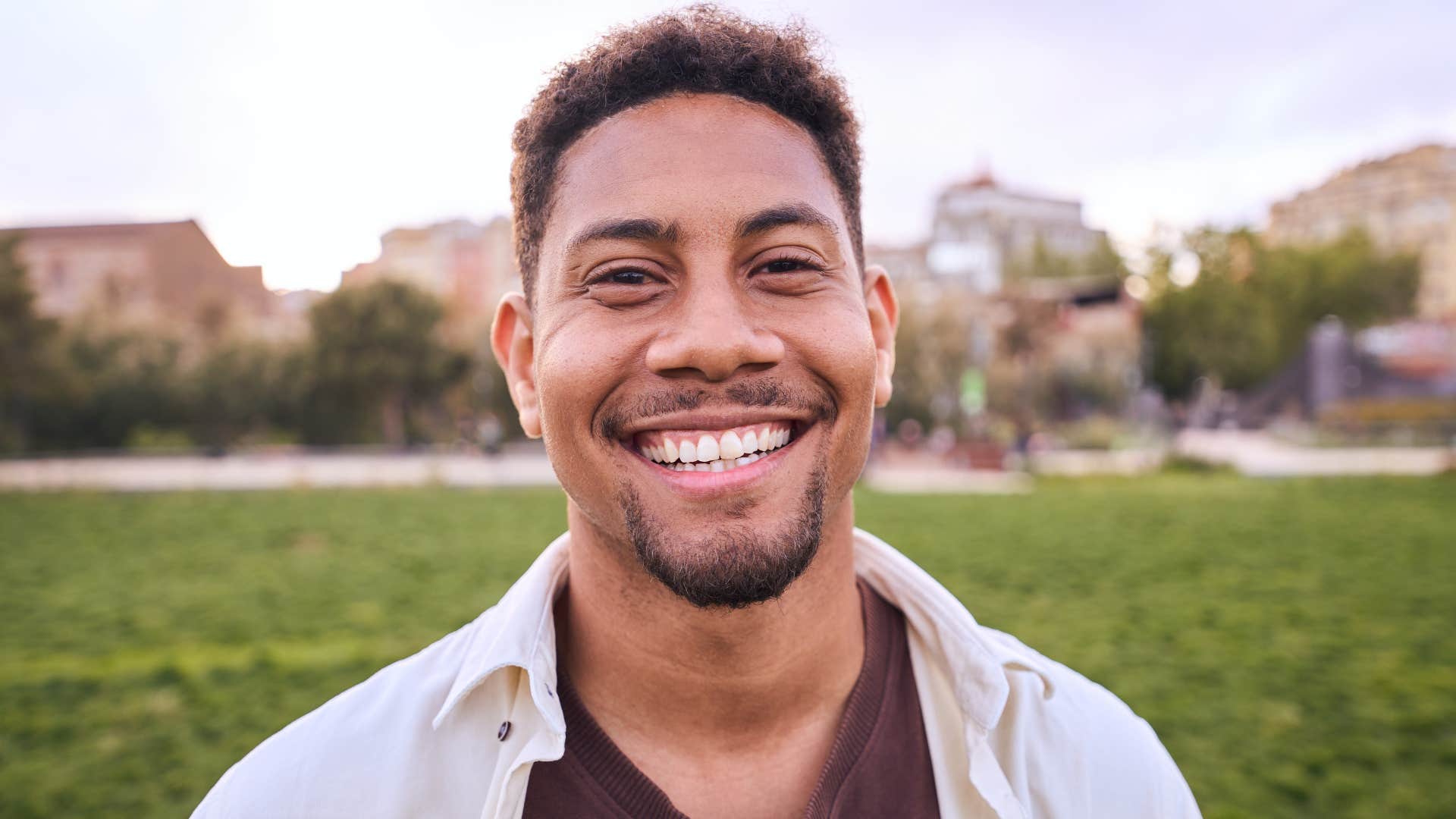 authentic man embracing his true self smiling