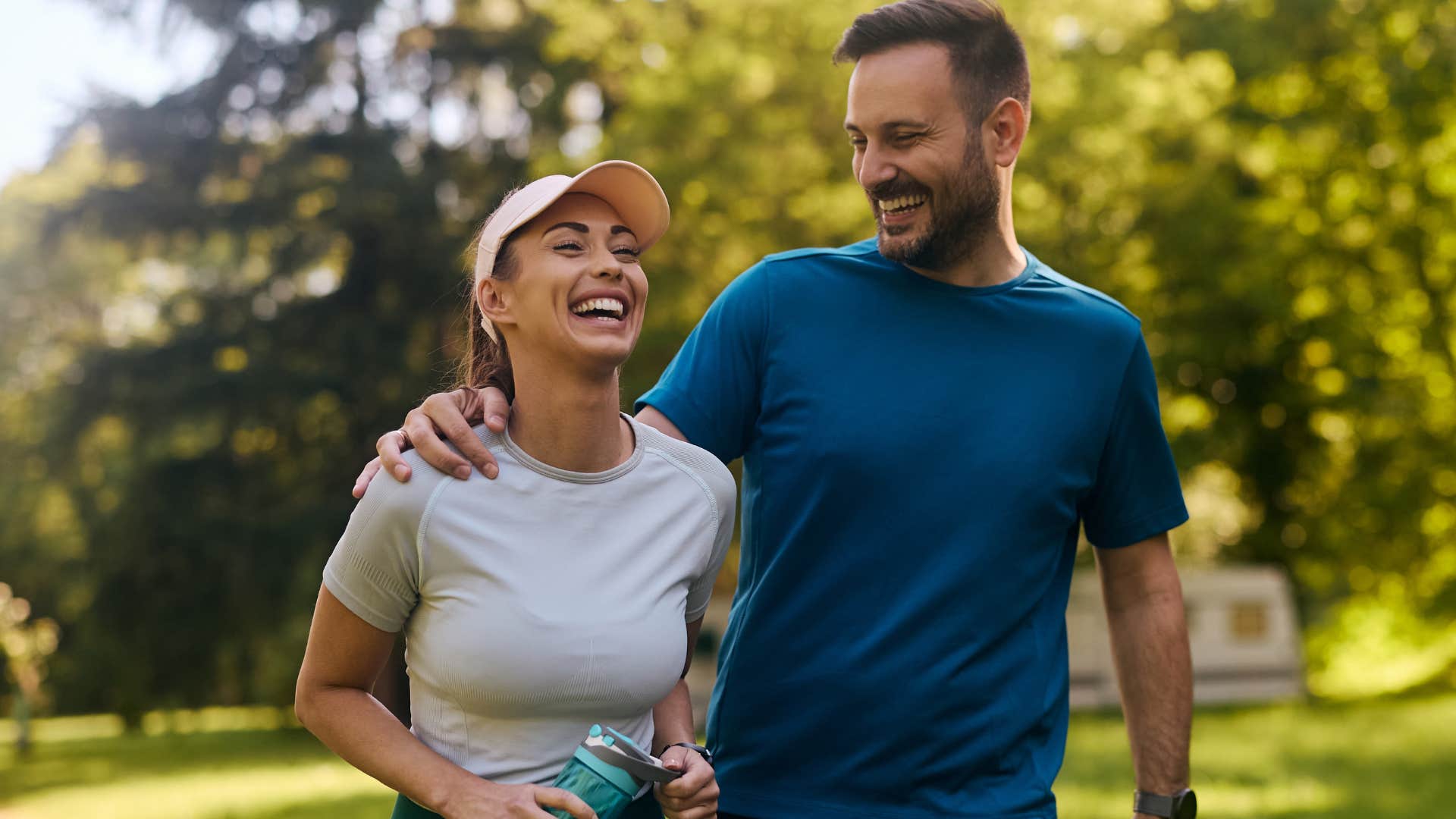 couple with a healthy body image smiling walking outside