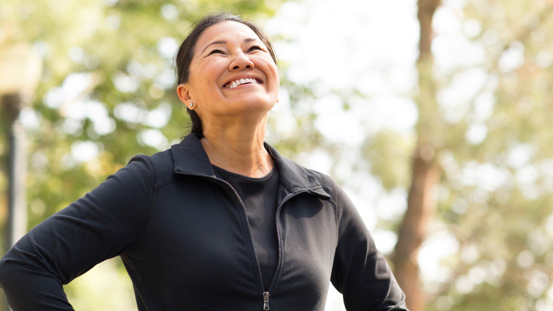 woman practicing self-soothing techniques outside