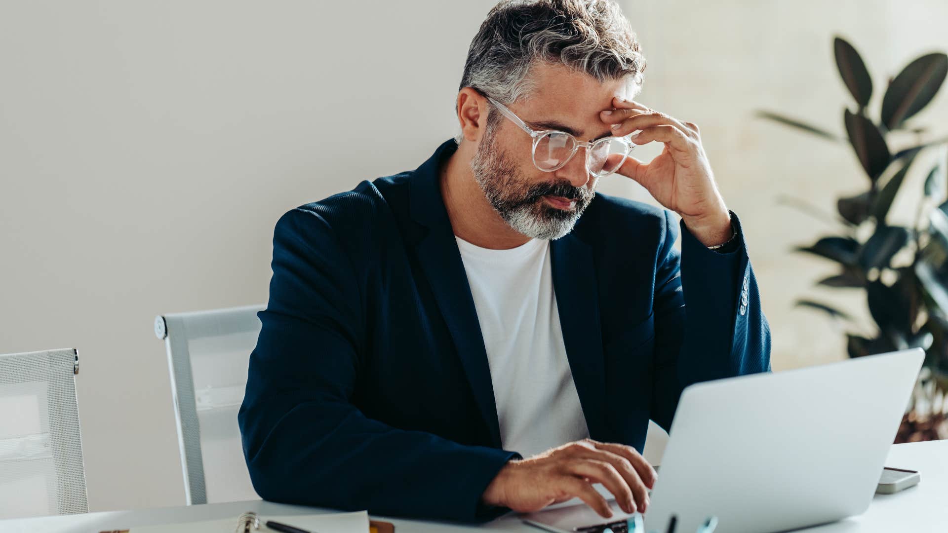 stressed man working not dealing with emotions