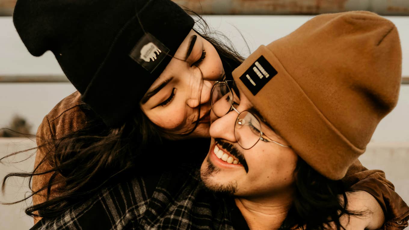 Thoughtful Questions To Ask A Man To Uncover His True, Unfiltered Character Woman asking man questions to uncover his true, unfiltered character.