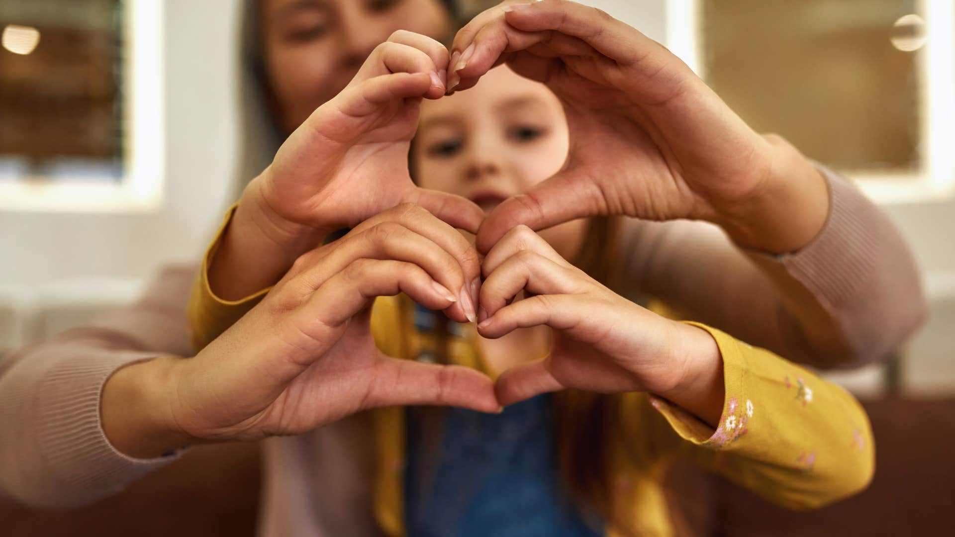 child and grandparent showing gratitude