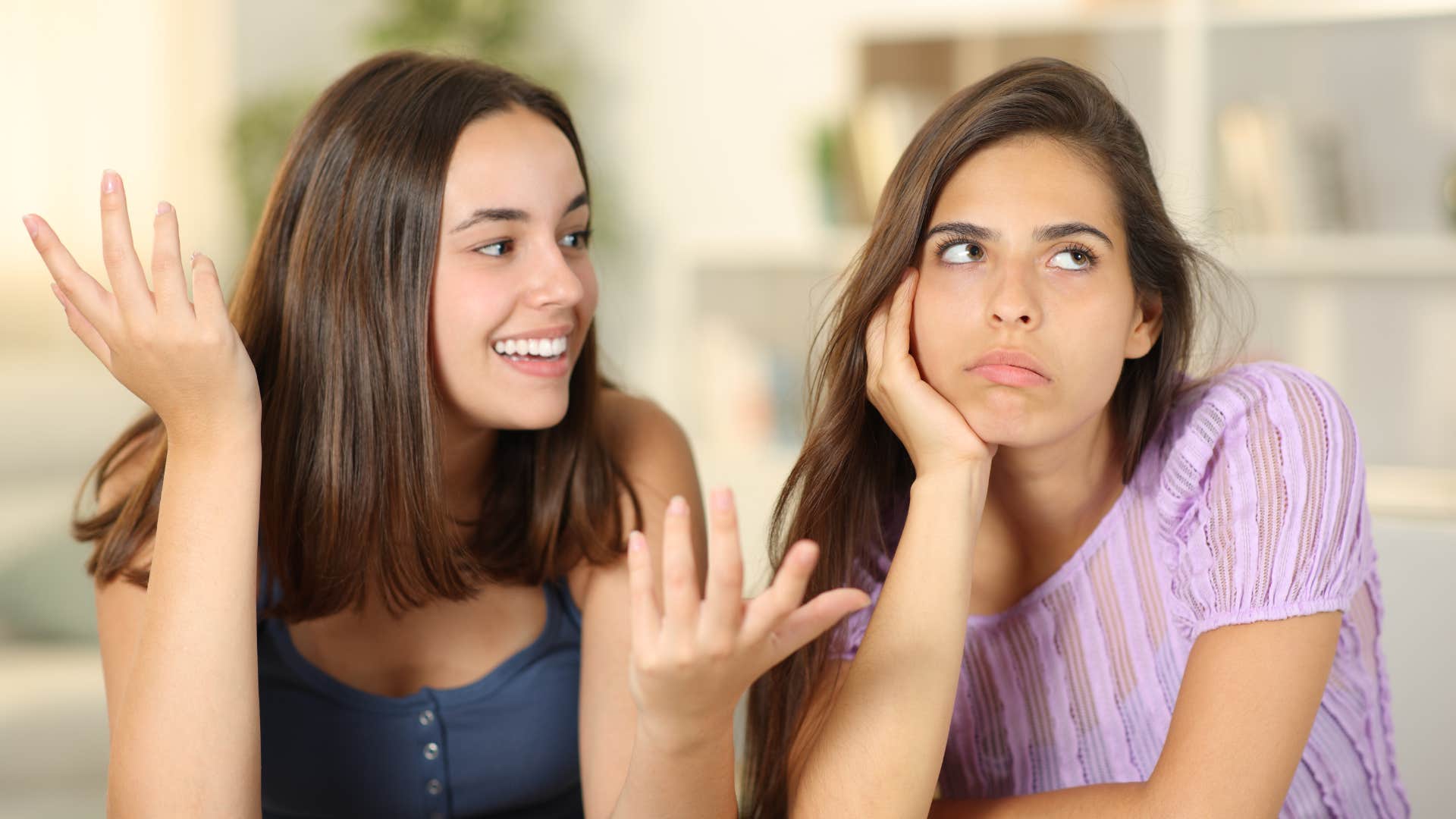 woman annoying her friend by talking about her partner