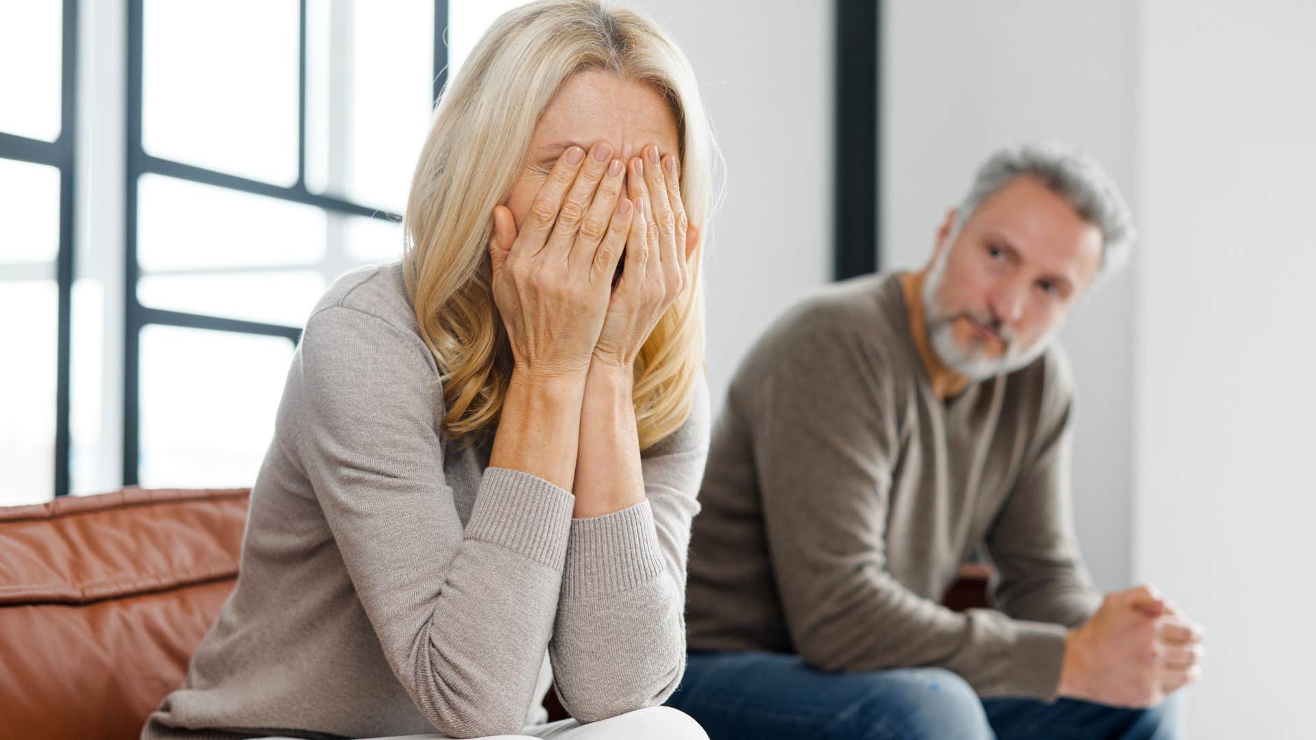 woman who acts differently around certain people turned away from her partner