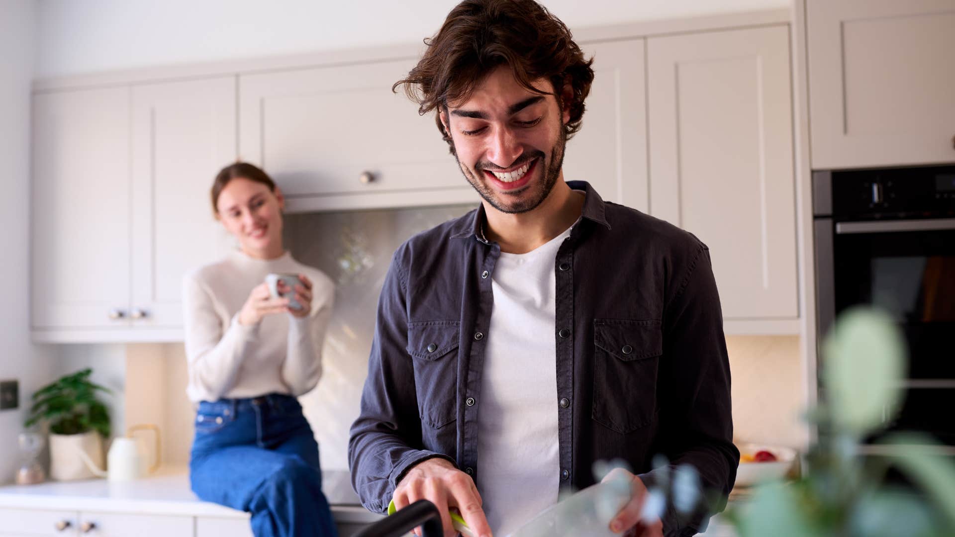 woman with self-respect watching man cook