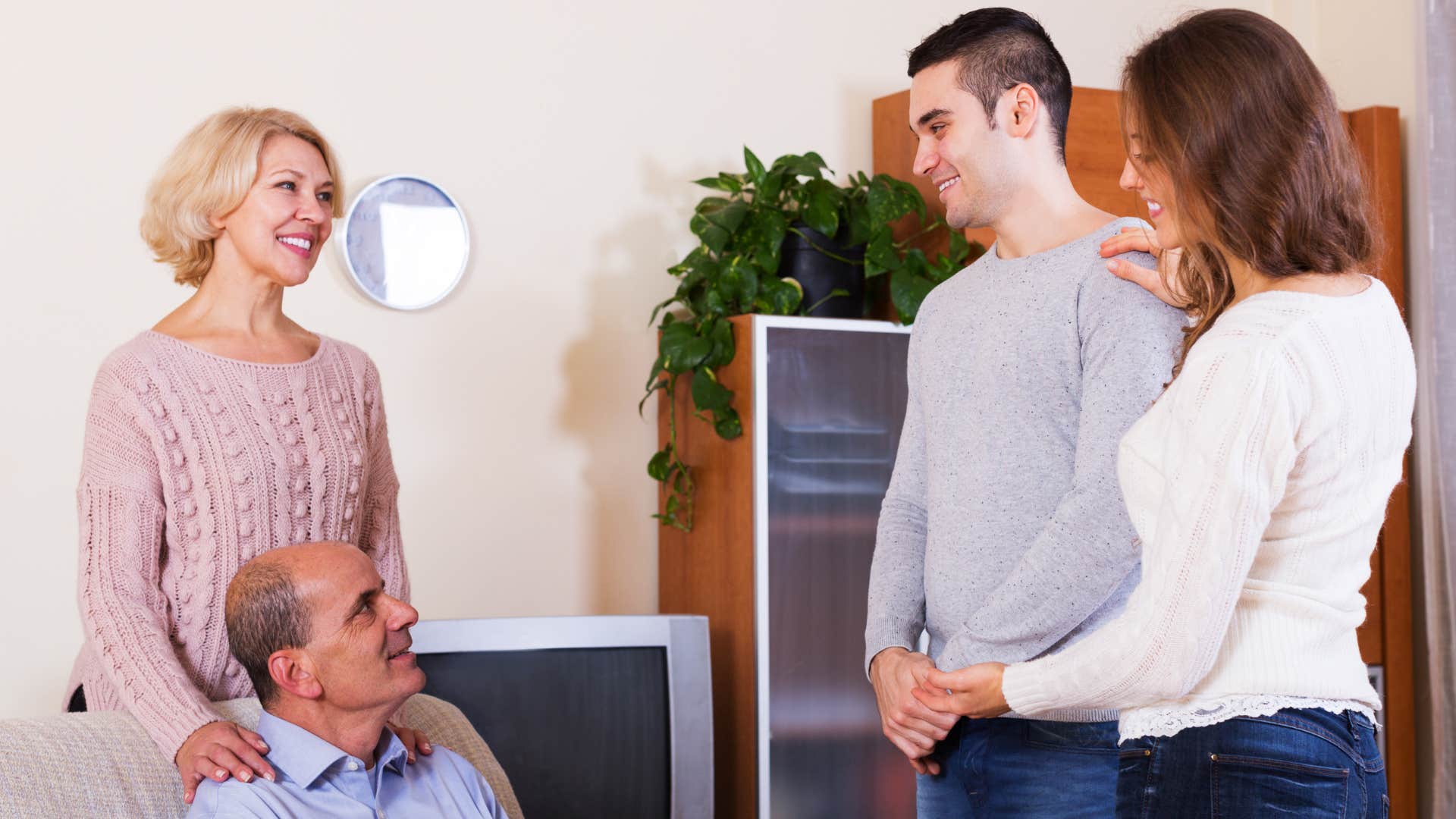 couple giving into peer pressure from parents