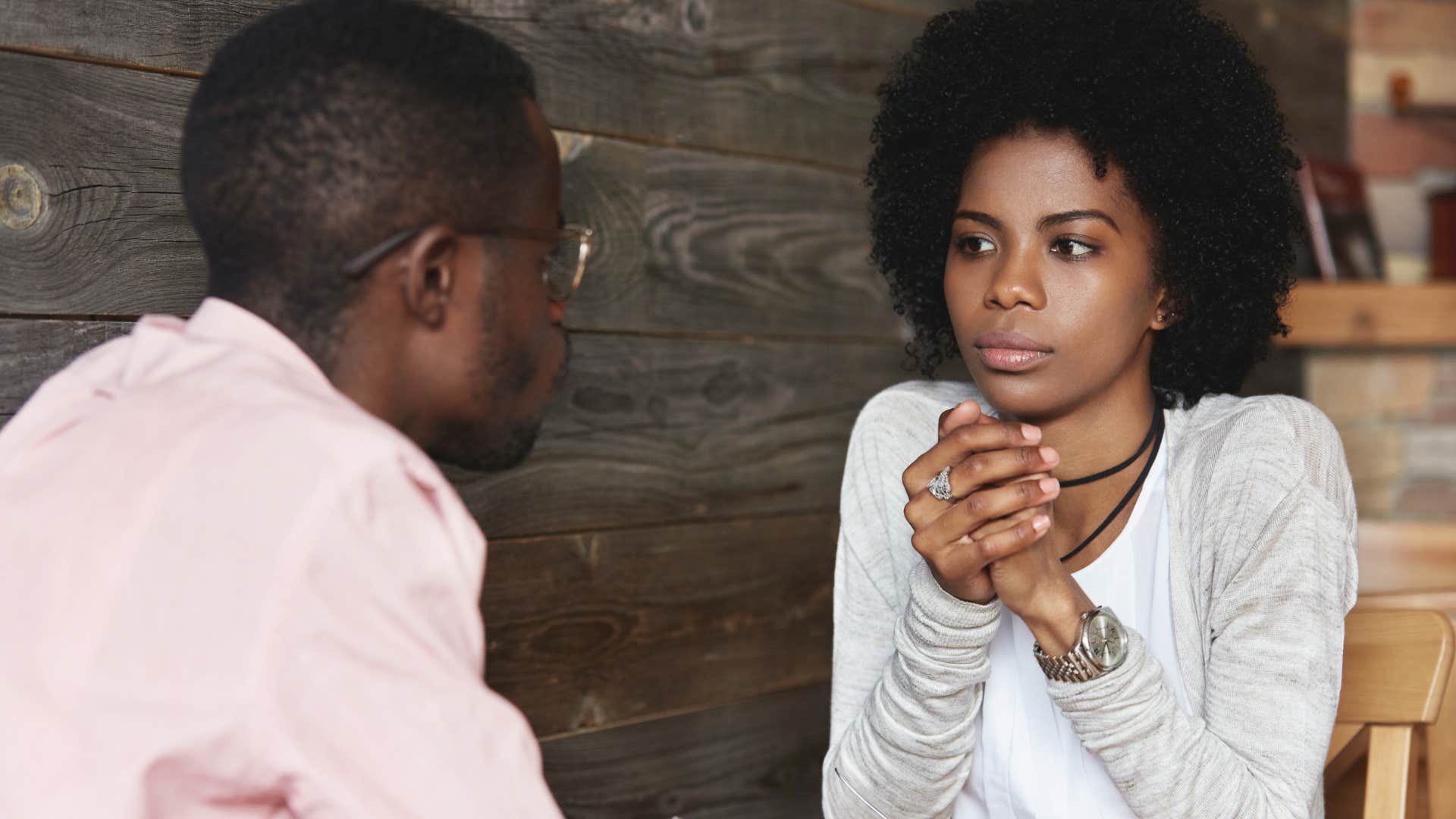 couple discussing keeping their relationship private