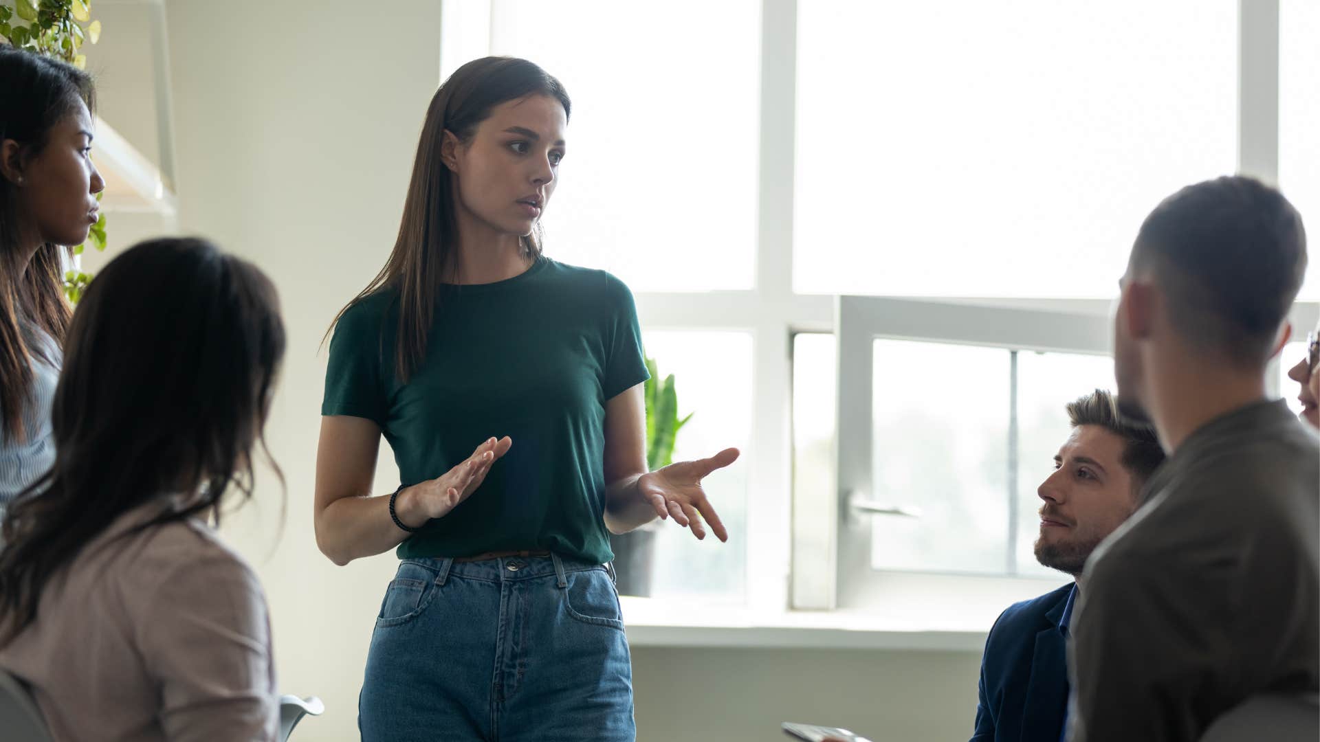 woman leading by example with coworkers
