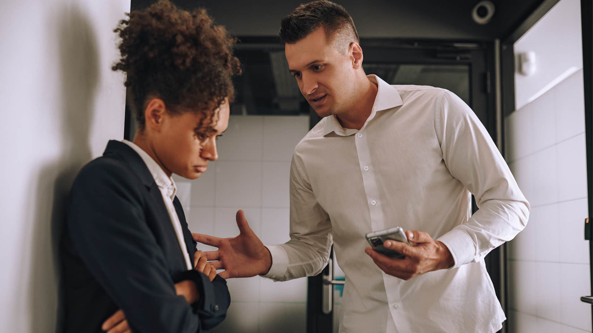 woman playing it cool with disrespectful coworker