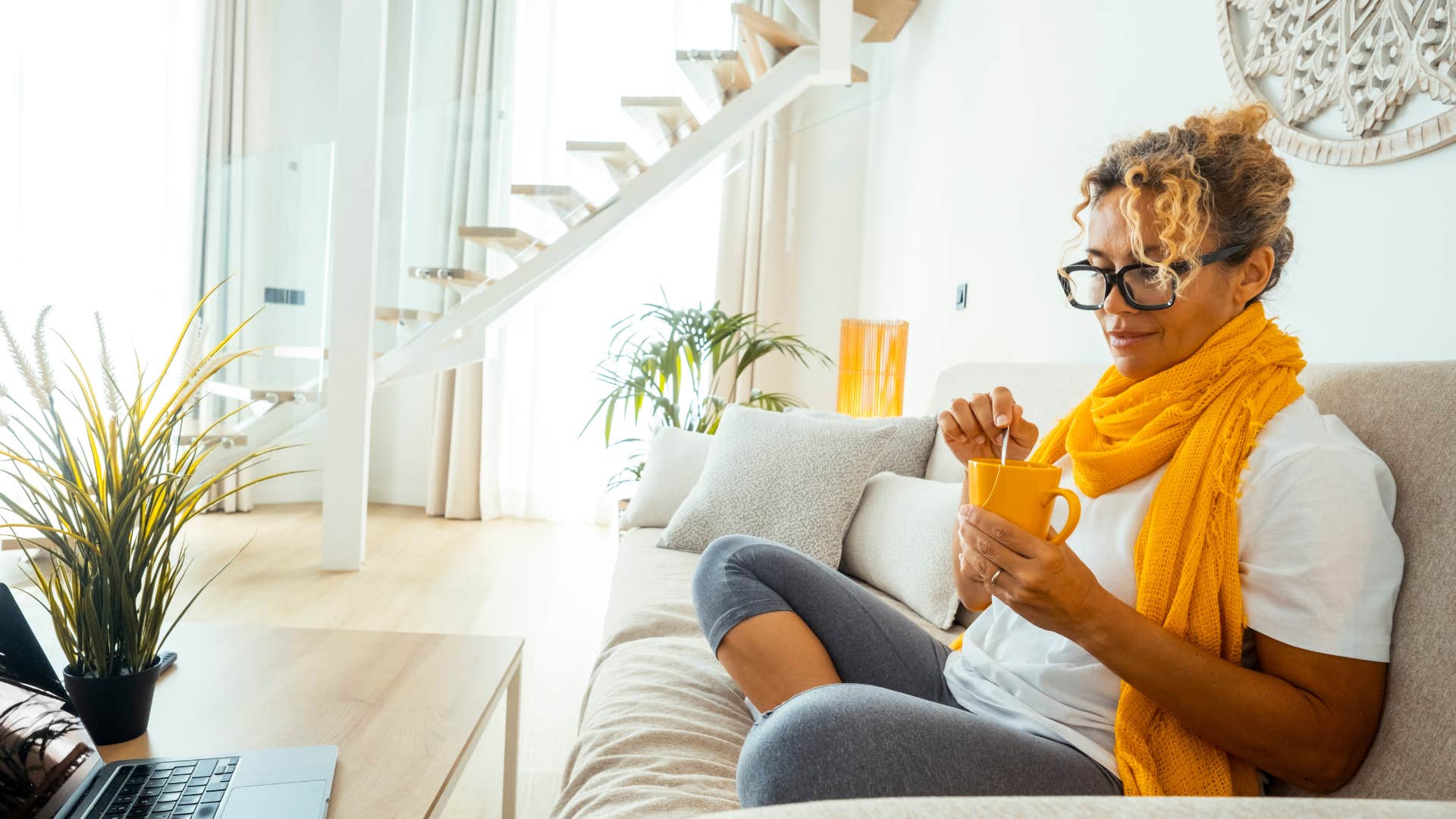 happy woman sitting with herself in silence