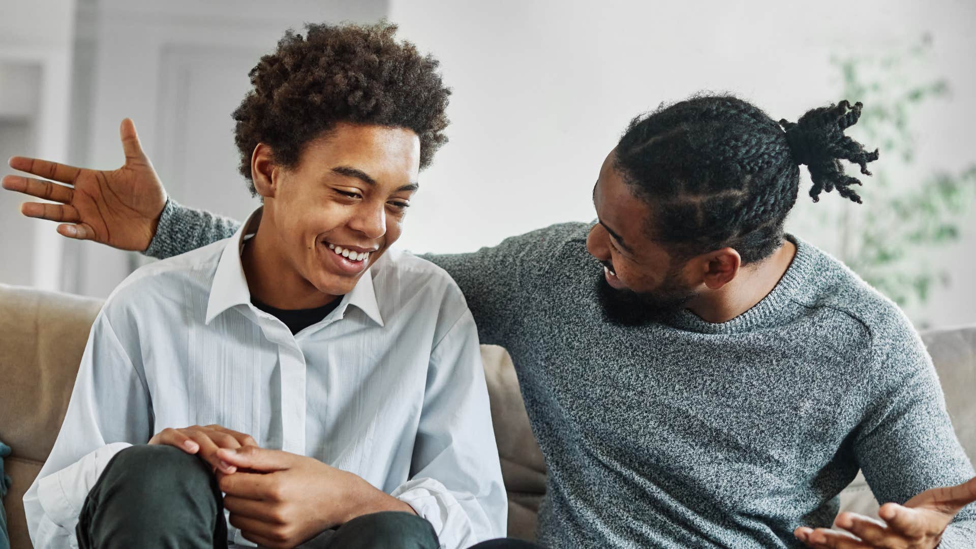 father having a hard conversation with his son