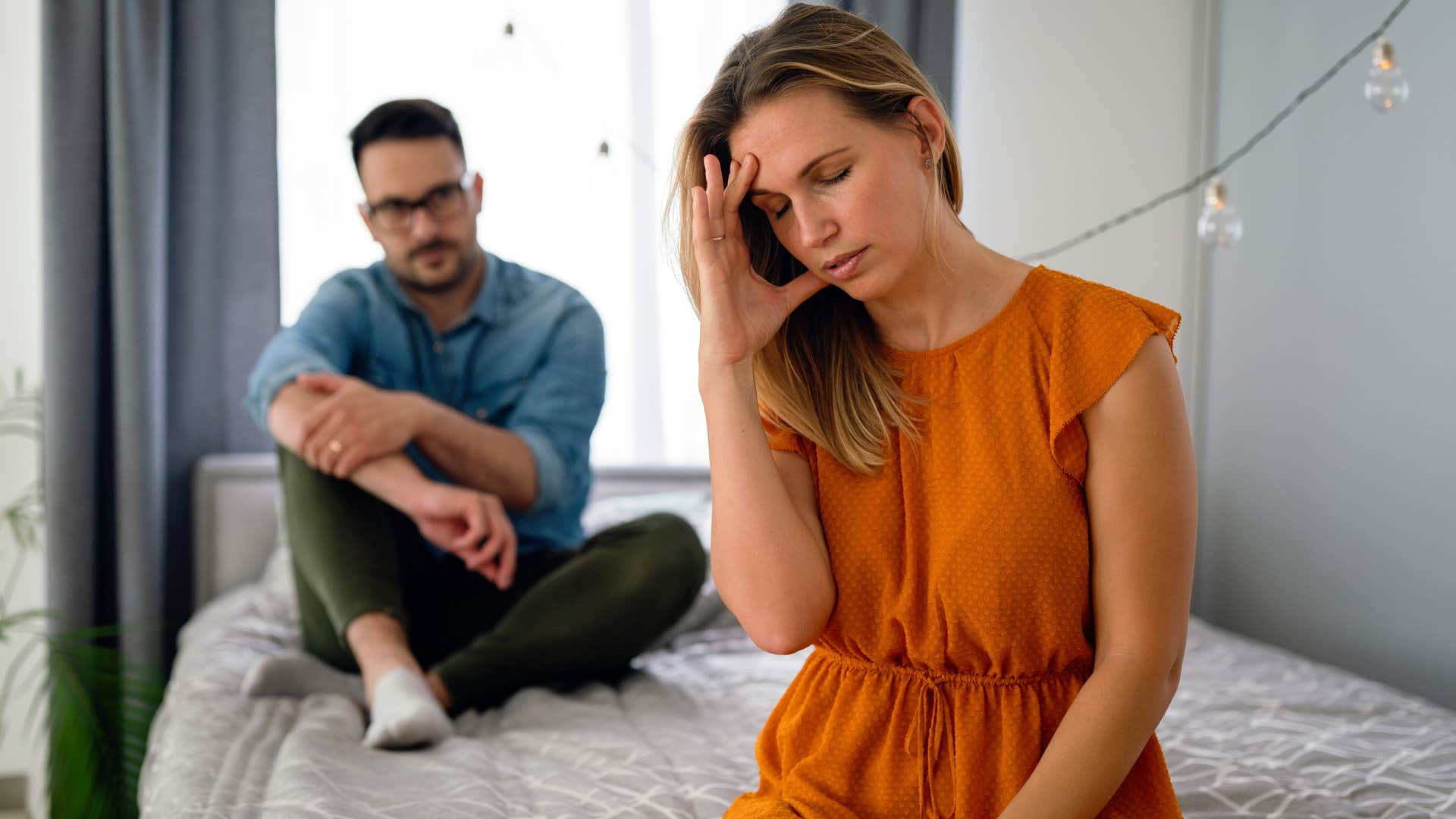 woman experiencing brain fog and confusion sitting next to man