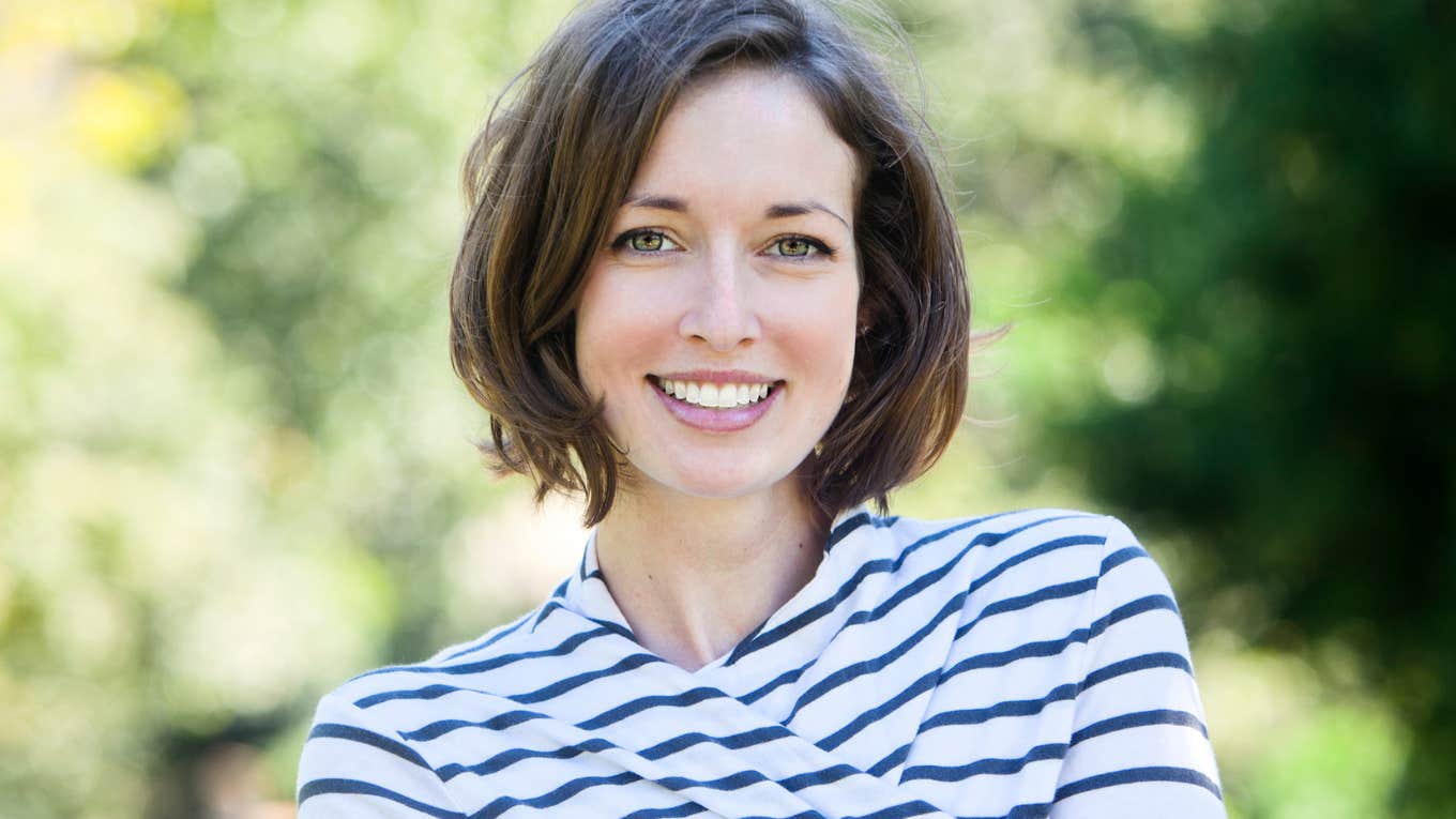 Surprising Work Behaviors That Will Put You Ahead Of Your Coworkers, According To Experts Woman is ahead of her coworkers.