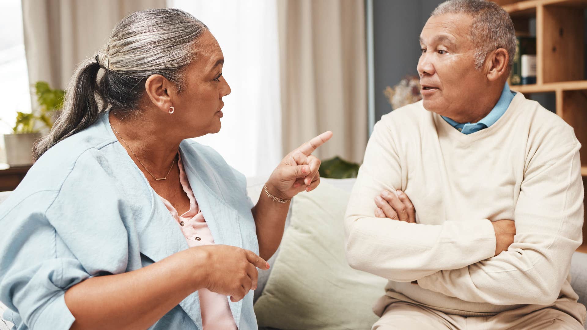 woman giving unsolicited advice to her husband