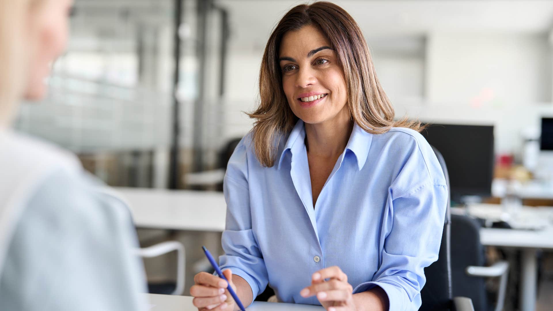 woman actively listening to her co-worker
