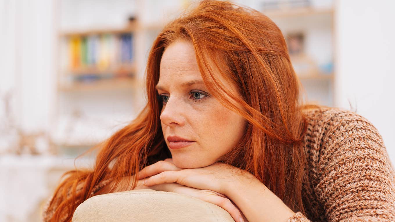 emotionally broken woman looking despondent