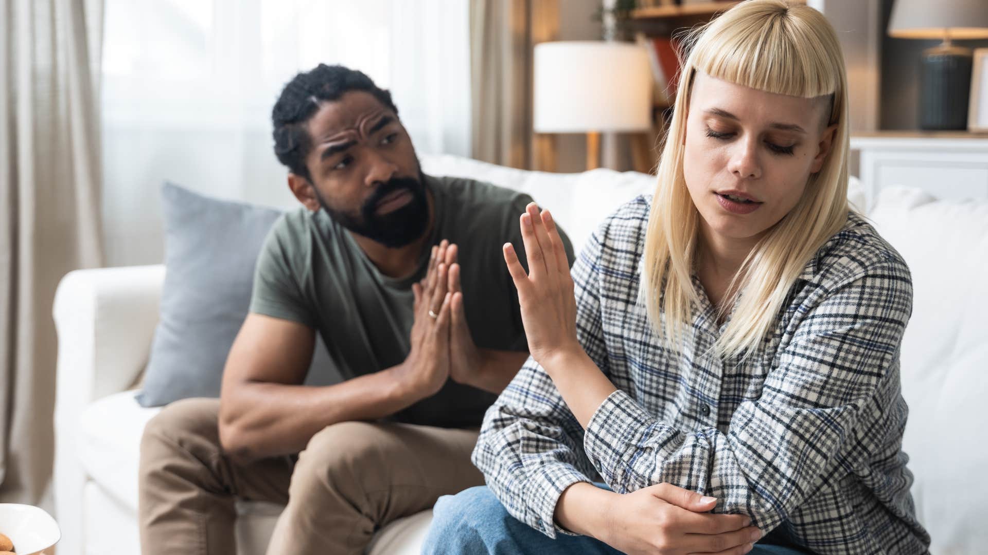 woman having a disproportionate reaction in argument with partner