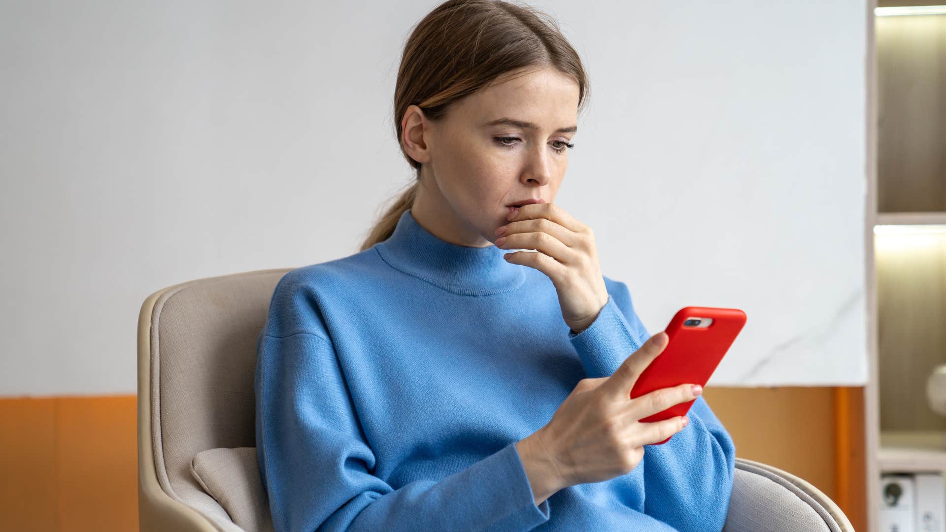 woman seeking validation on her phone