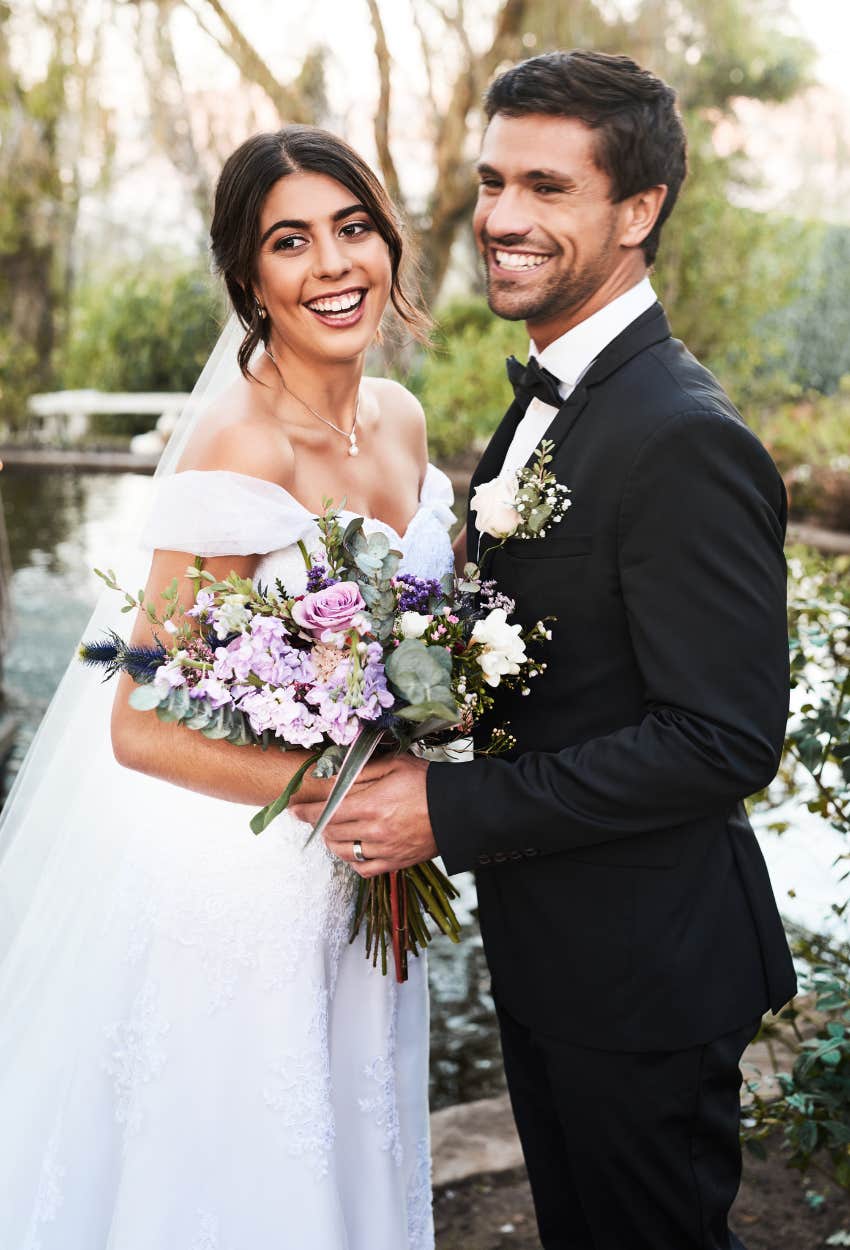 Bride and groom who revealed they eloped three years prior to the wedding
