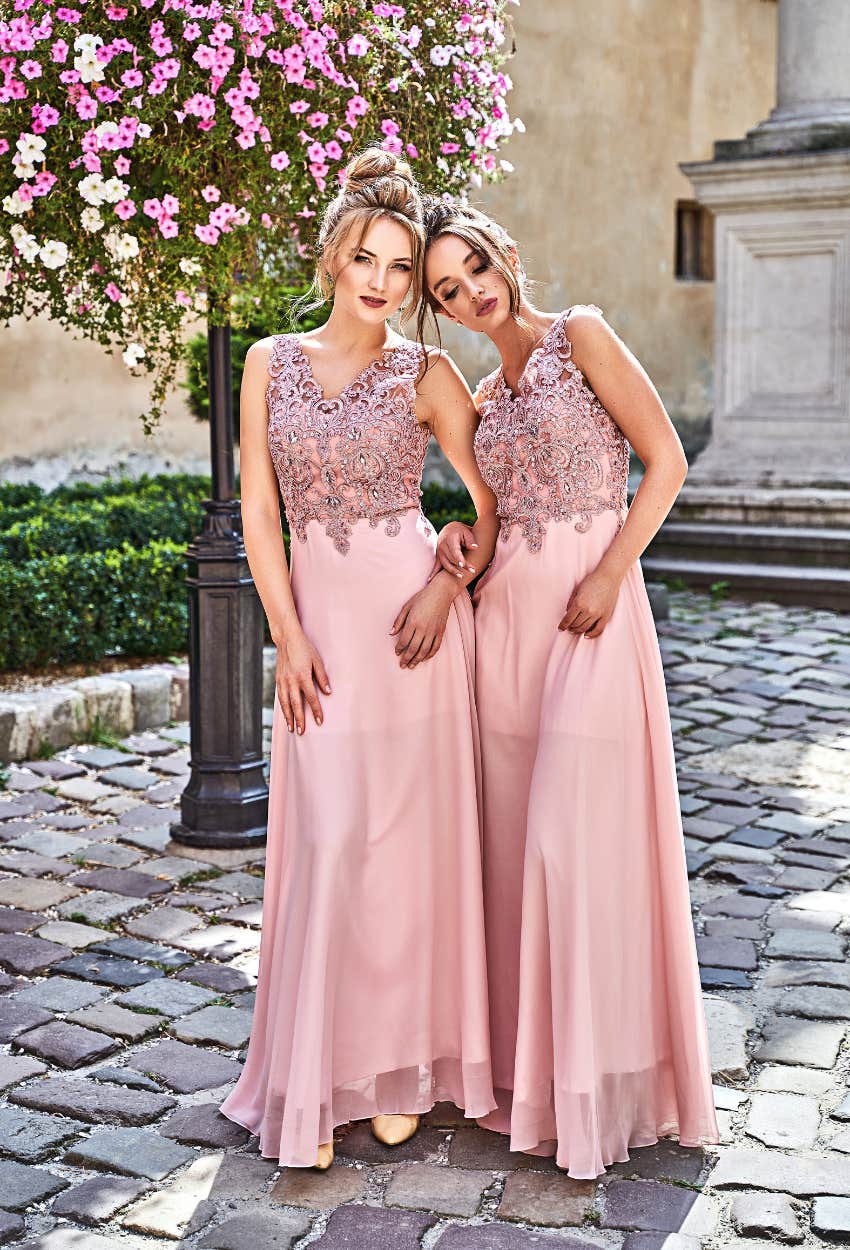 bridesmaids in salmon pink dresses all the female guest had to wear