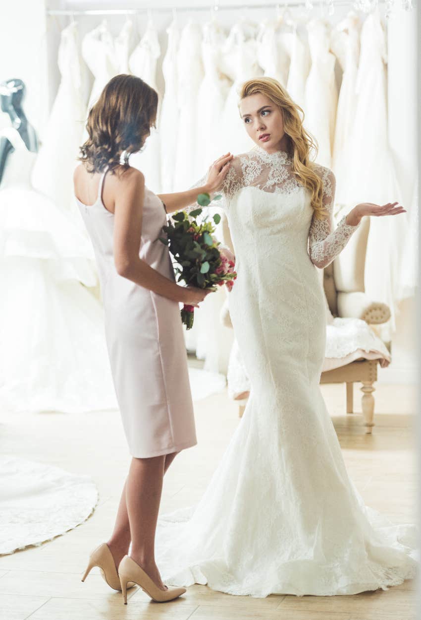 bride and her bridesmaid arguing