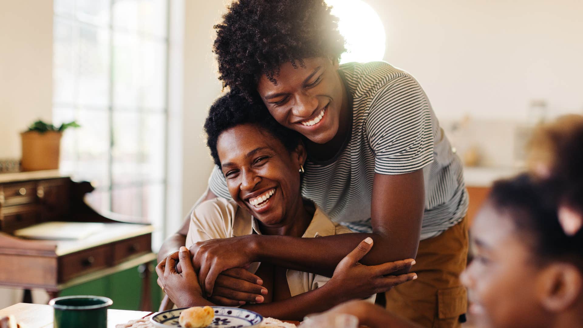 woman teaching her son that wealth doesn't equate to self-worth