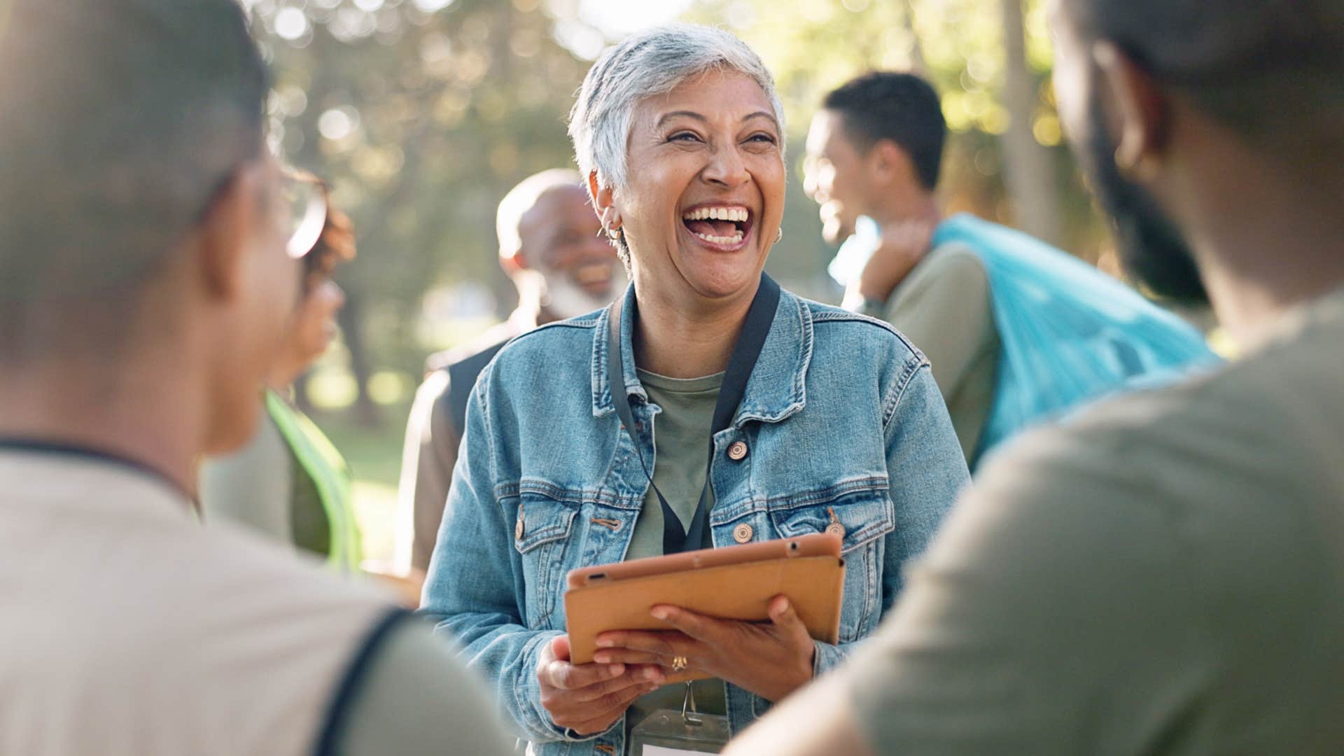 working class woman smiling able to talk to anyone outside
