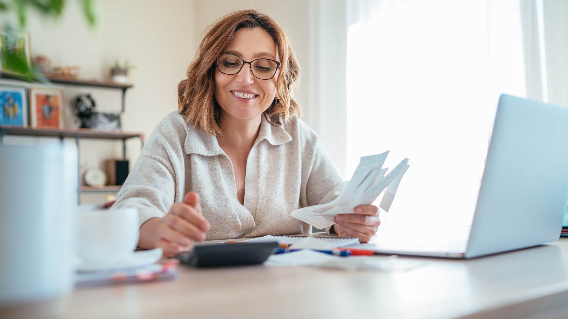 woman tracking every dollar she spends