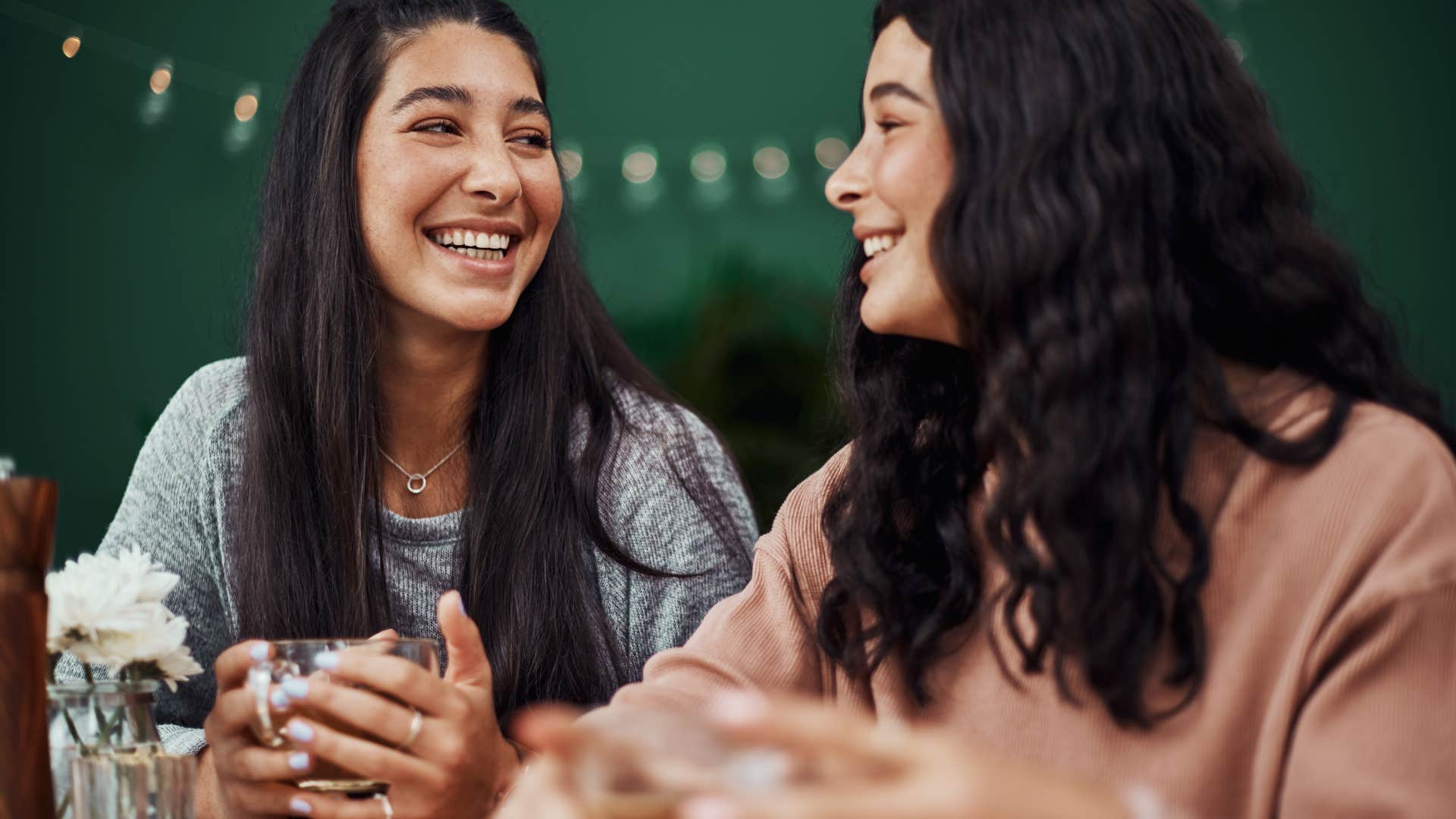 woman with friend who cares by focusing full attention on her