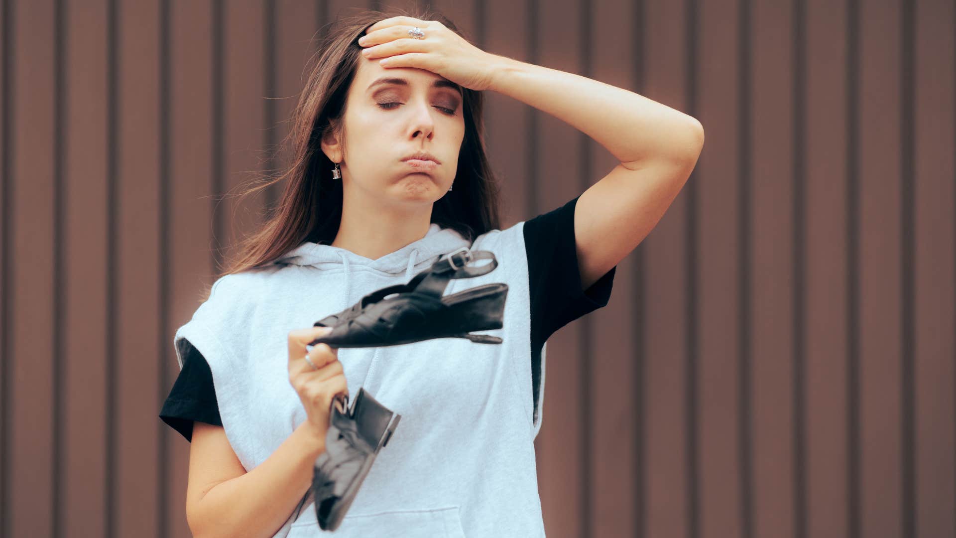 a womans heel breaks after she did not keep up maintenance on her shoes