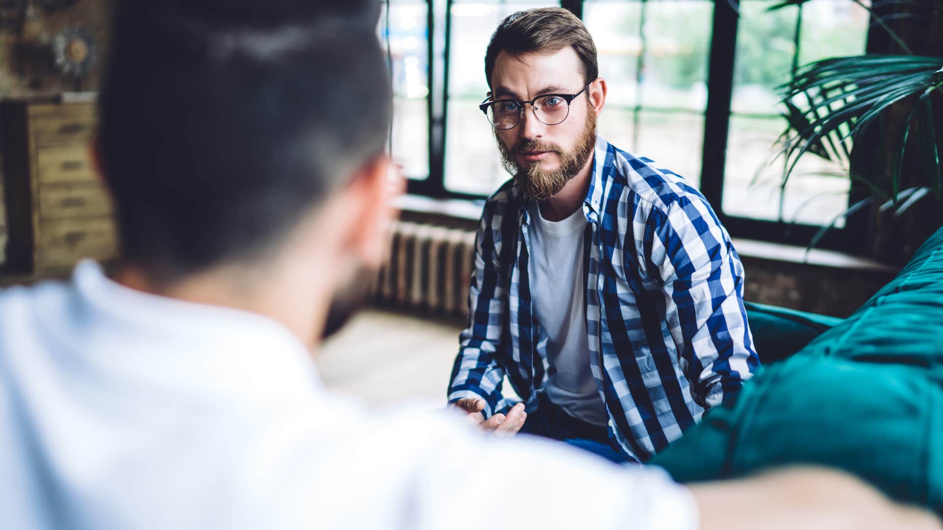 man asking his friend if what he just said made sense